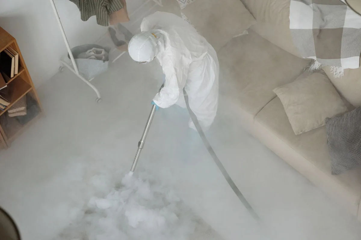 Biohazard cleanup technician in protective equipment, Adair Park, Atlanta, GA